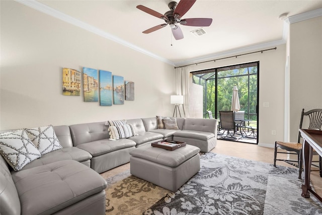 tiled living room with ceiling fan and ornamental molding