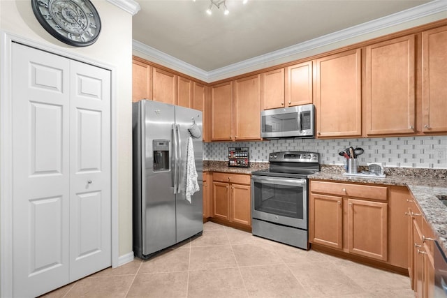 kitchen with ornamental molding, backsplash, light tile patterned floors, light stone countertops, and appliances with stainless steel finishes