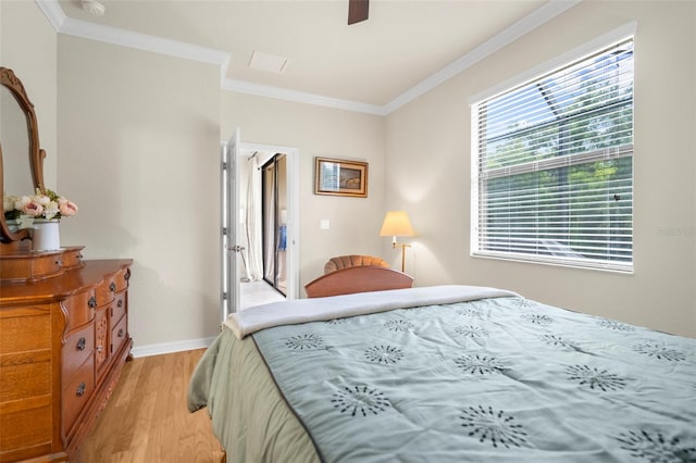 bedroom featuring ceiling fan, ornamental molding, and light hardwood / wood-style floors