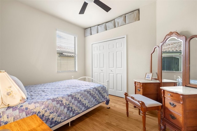 bedroom featuring a closet, ceiling fan, and light hardwood / wood-style floors