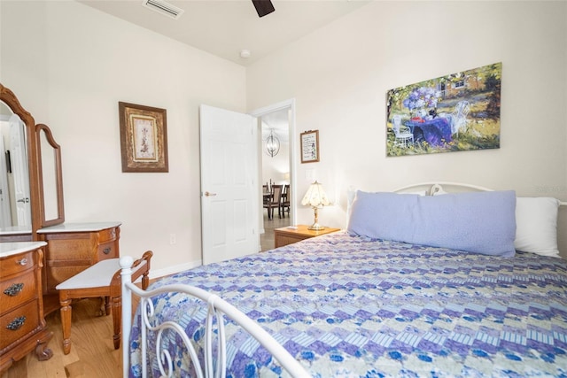 bedroom featuring light wood-type flooring and ceiling fan