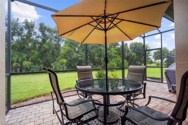 view of patio / terrace with a lanai