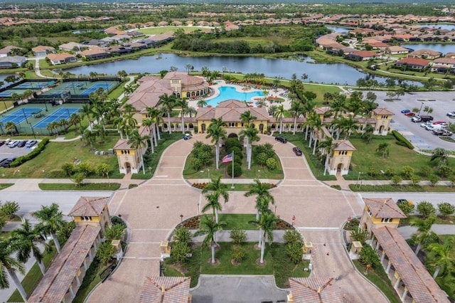 birds eye view of property with a water view