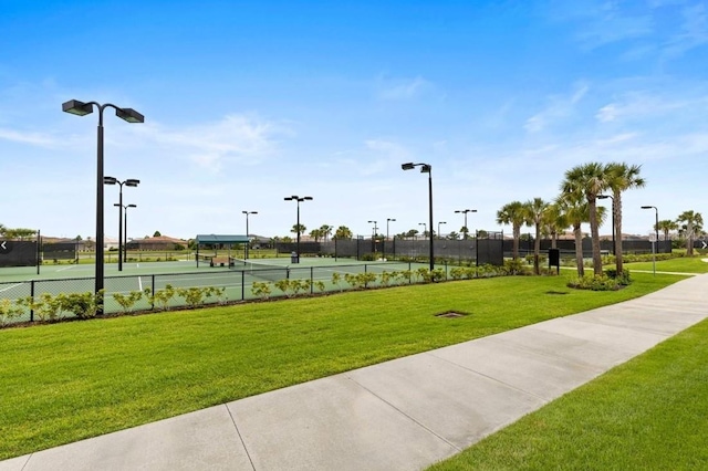 view of property's community featuring a lawn