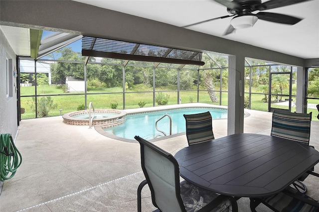 view of swimming pool featuring an in ground hot tub, a patio, and ceiling fan