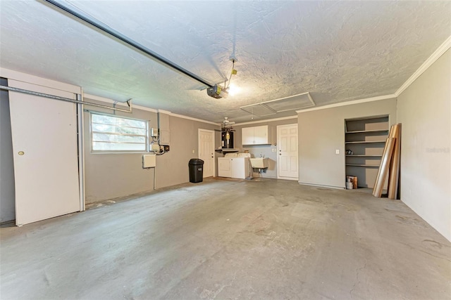 garage with washer and clothes dryer and sink