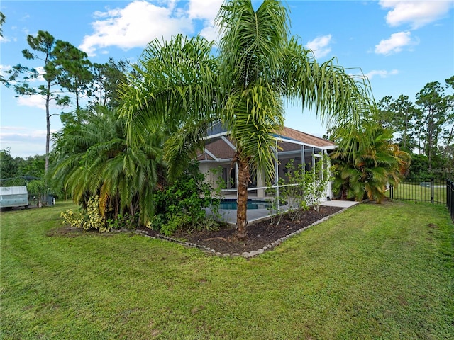 view of yard featuring a lanai