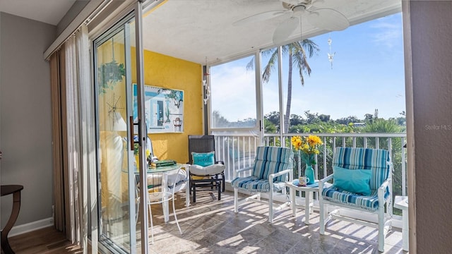 balcony featuring a ceiling fan