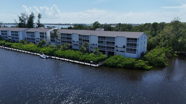 drone / aerial view with a water view