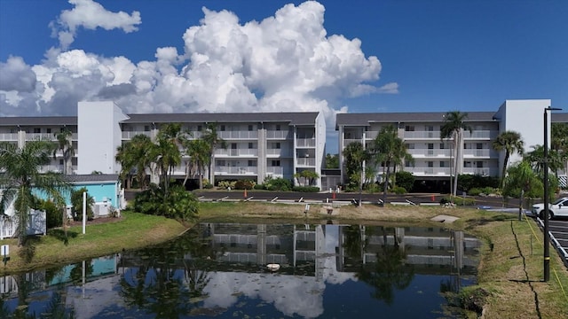 view of building exterior with a water view