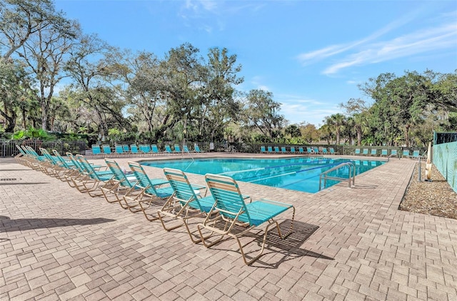 view of pool featuring a patio area