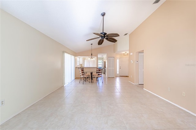 unfurnished living room featuring high vaulted ceiling, ceiling fan, and light tile patterned flooring