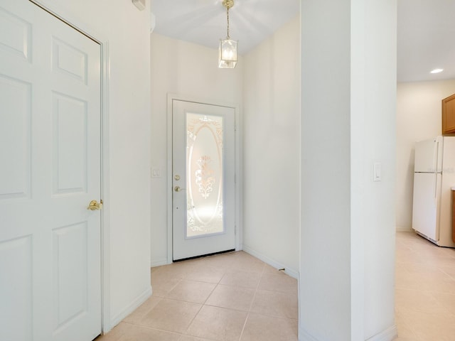 entryway featuring light tile patterned floors