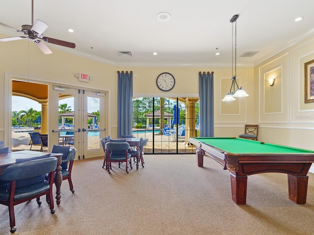 playroom featuring billiards, french doors, ornamental molding, and carpet