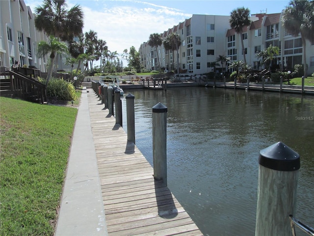 dock area with a water view