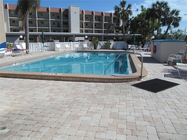 view of swimming pool featuring a patio