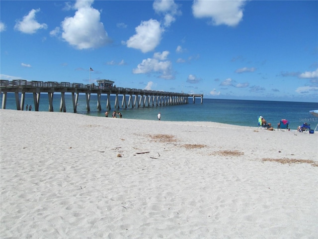 view of water feature with a beach view