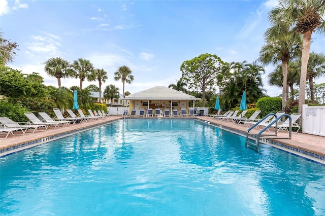 view of swimming pool featuring a patio