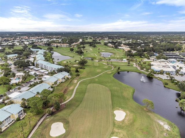 birds eye view of property with a residential view, a water view, and golf course view