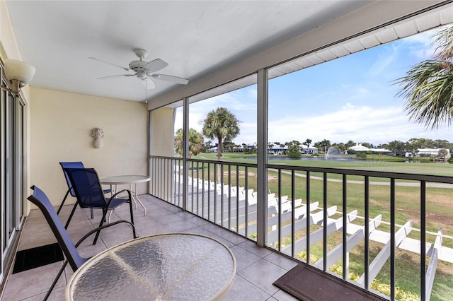 balcony featuring a ceiling fan