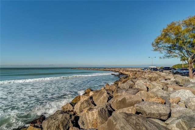 property view of water with a beach view