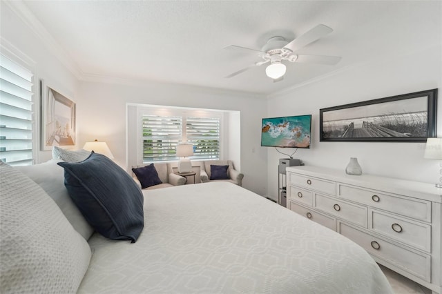 bedroom featuring ceiling fan and crown molding