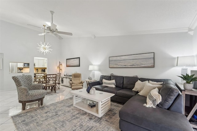 tiled living room with ceiling fan with notable chandelier and crown molding