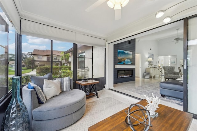 interior space featuring a fireplace and ceiling fan