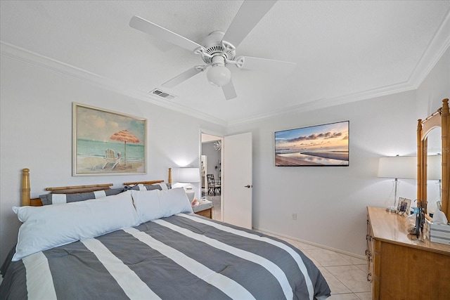 bedroom featuring ceiling fan, light tile patterned floors, a textured ceiling, and ornamental molding