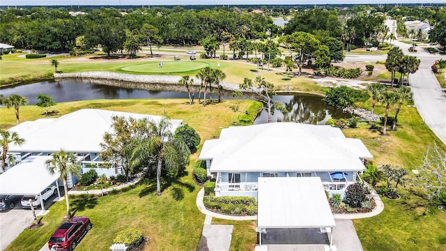 birds eye view of property featuring a water view and golf course view