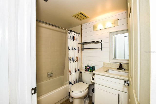 full bathroom featuring shower / bathtub combination with curtain, wood walls, vanity, and toilet