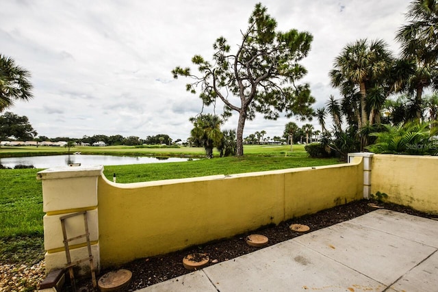 view of patio / terrace with a water view