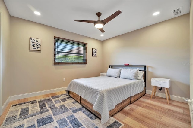 bedroom featuring ceiling fan and light wood-type flooring