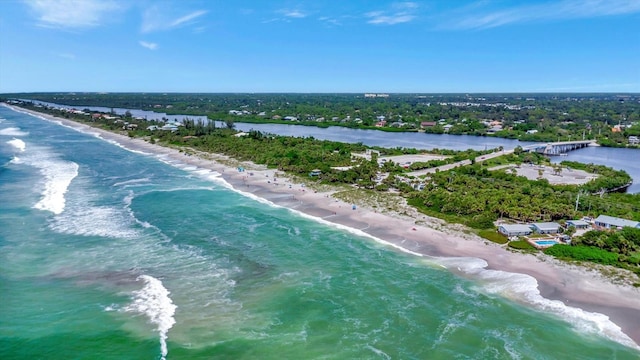 bird's eye view featuring a view of the beach and a water view