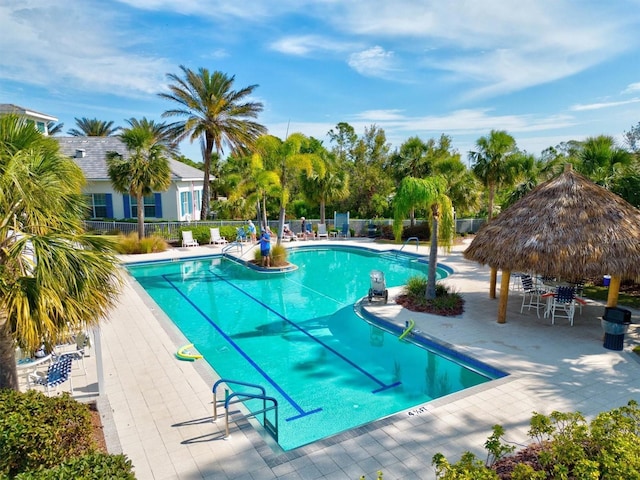 view of swimming pool featuring a gazebo and a patio