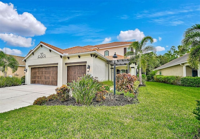 mediterranean / spanish home featuring a garage and a front lawn