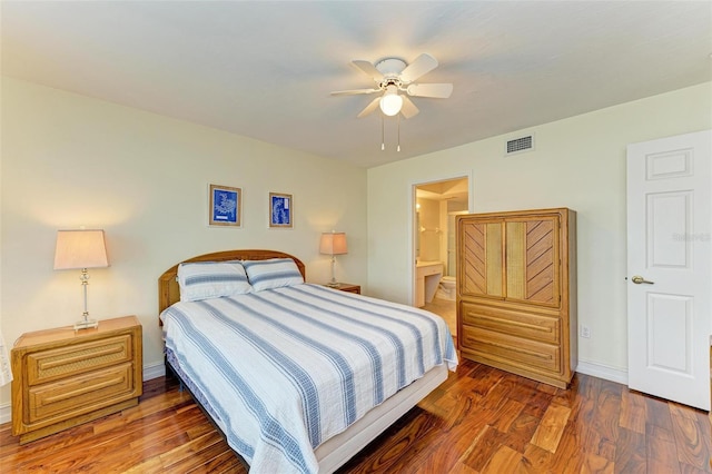 bedroom featuring ensuite bathroom, ceiling fan, and dark hardwood / wood-style floors