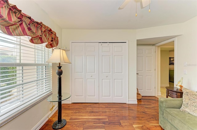 interior space featuring ceiling fan and hardwood / wood-style flooring