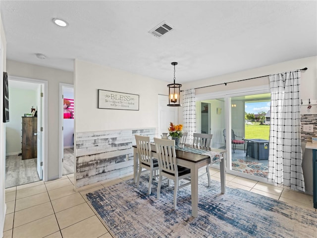 dining room featuring light tile patterned flooring