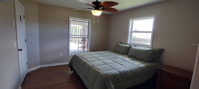 bedroom featuring ceiling fan and dark hardwood / wood-style floors