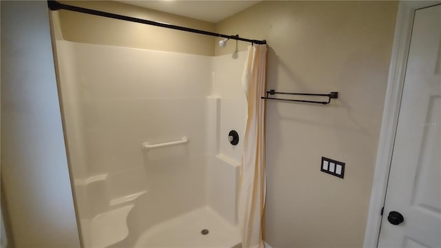 bathroom featuring walk in shower