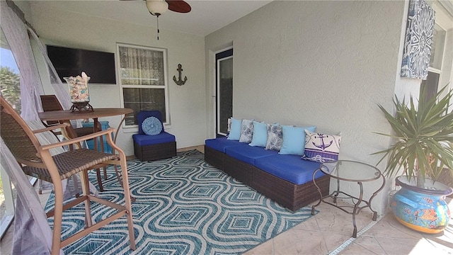 view of patio / terrace featuring ceiling fan