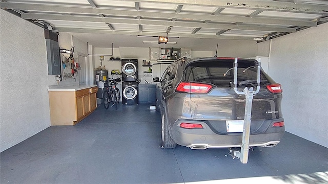 garage featuring a garage door opener and electric water heater