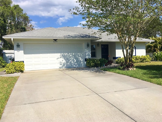 single story home with a garage