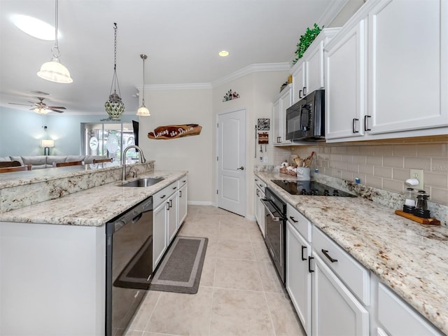 kitchen with black appliances, sink, ceiling fan, decorative light fixtures, and white cabinetry