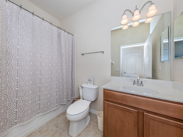 full bathroom featuring tile patterned flooring, shower / tub combo with curtain, vanity, and toilet