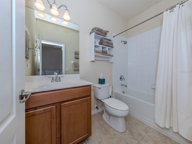 full bathroom with tile patterned floors, vanity, shower / tub combo, and toilet