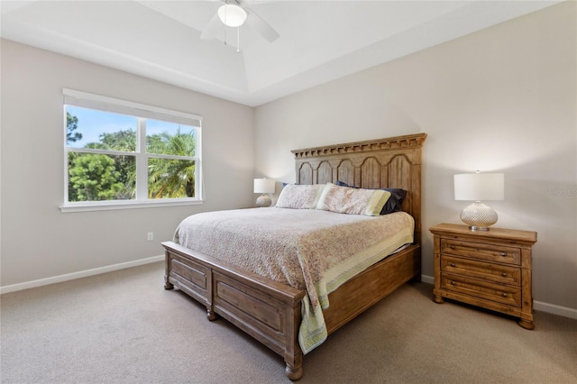 bedroom featuring light carpet and ceiling fan