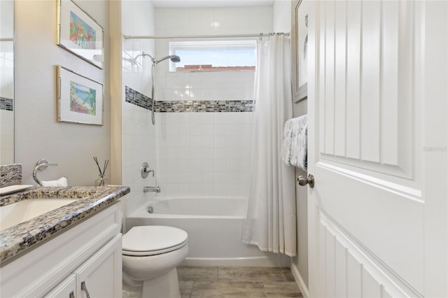 full bathroom featuring vanity, toilet, and shower / bathtub combination with curtain