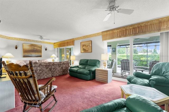 carpeted living room with a textured ceiling and ceiling fan